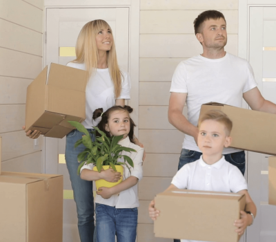 videoblocks-family-moving-to-a-new-home-young-exaciting-family